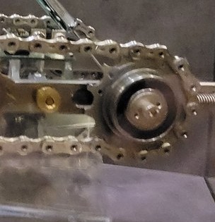 Figure 3 — Detail of the actual running gear: machined sprocket teeth meshing
with the bicycle-chain track run.